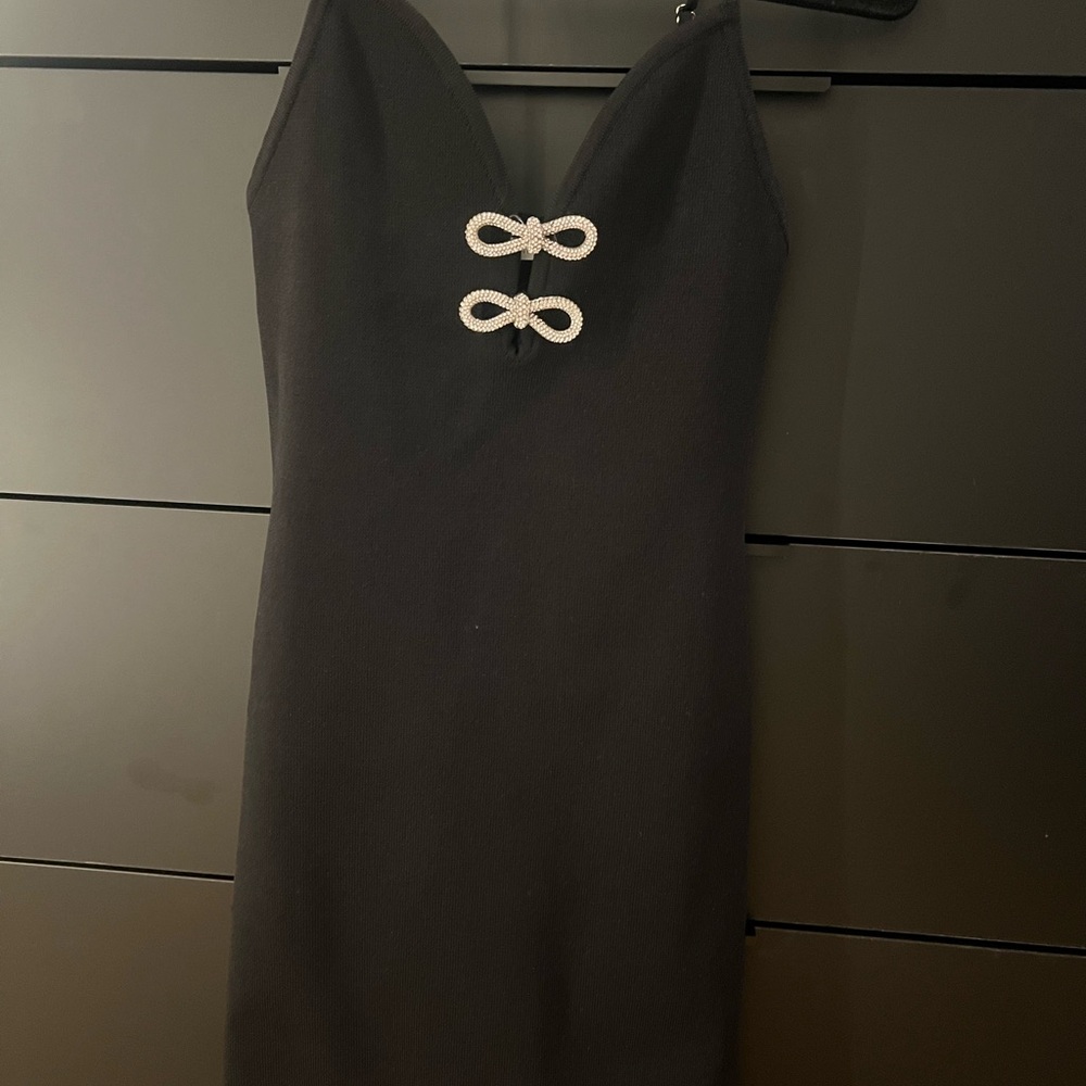 Elegant Black Dress with Bow Accents